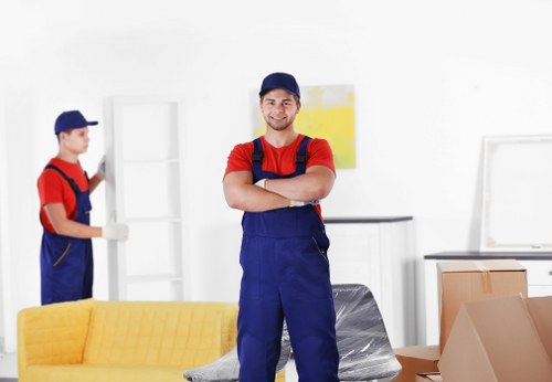 Packing boxes and furniture for house removals in Docklands
