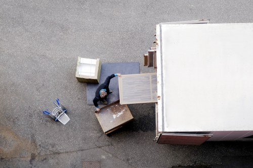 Customer using safe lifting practices near storage units